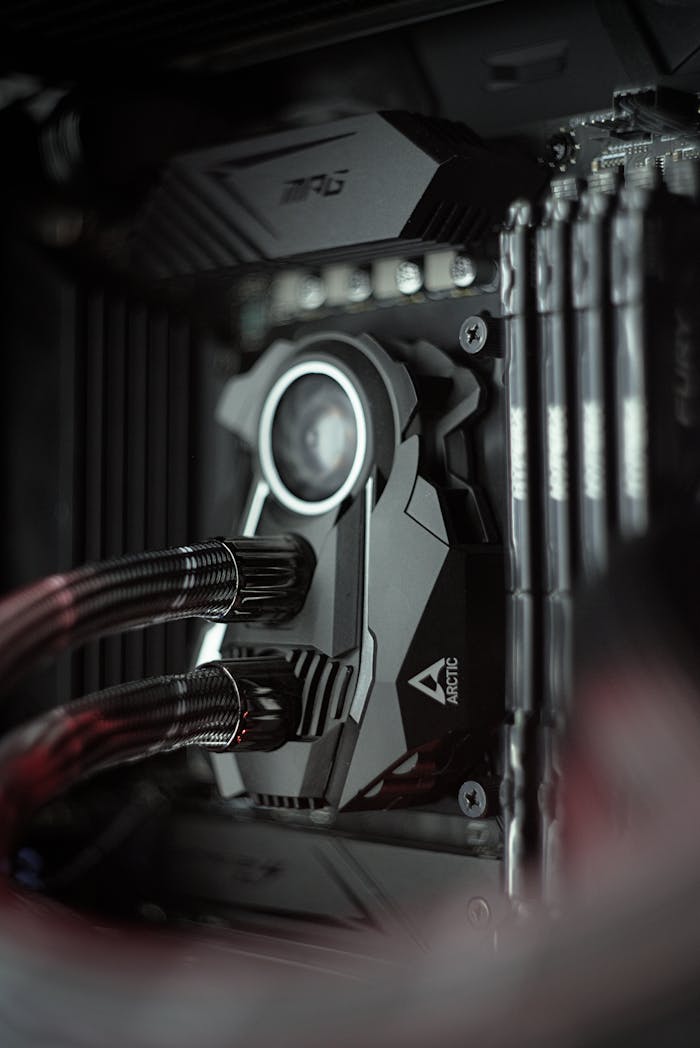 services-03 Detailed image of a high-tech PC cooling system with wiring and equipment.